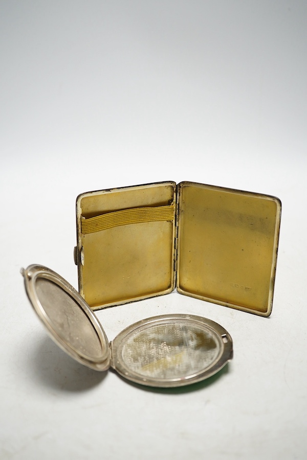 Two George V silver and guilloche enamel compacts, Birmingham 1930 and 1934, 7cm and 8cm. Condition - fair